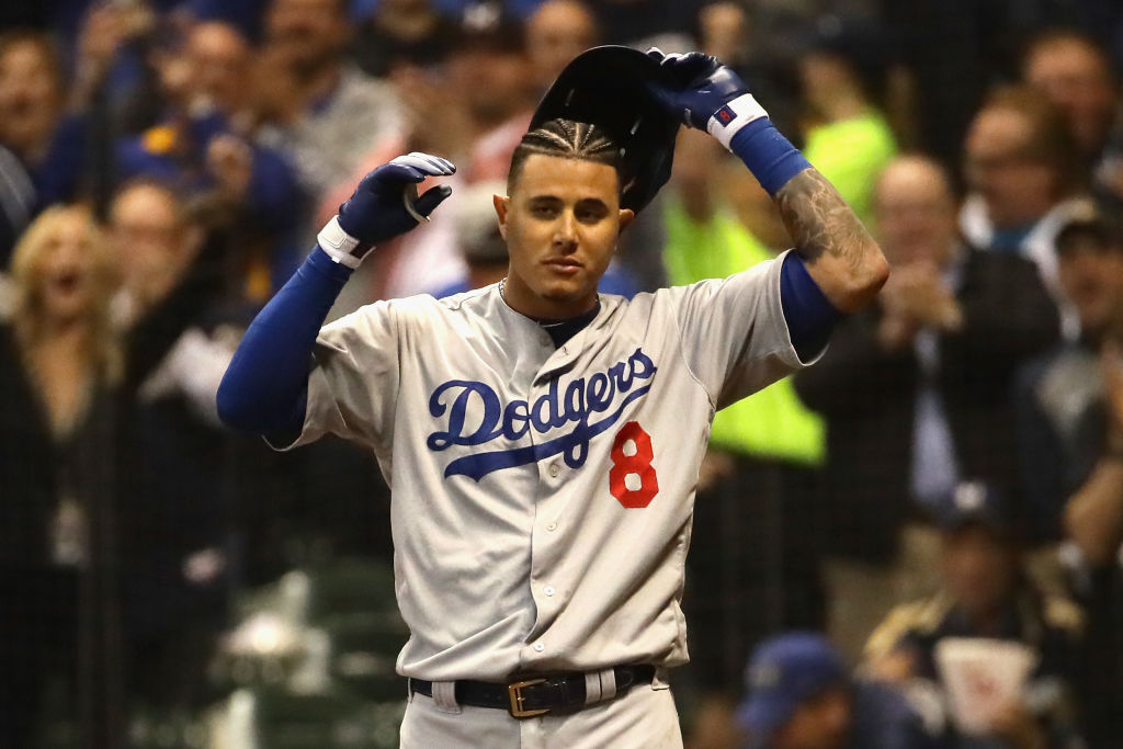 Manny Machado #8 of the Los Angeles Dodgers reacts after striking out against Corey Knebel #46 of the Milwaukee Brewers during the fifth inning in Game Six of the National League Championship Series at Miller Park on October 19, 2018 in Milwaukee, Wisconsin.  (Photo by Jonathan Daniel/Getty Images)