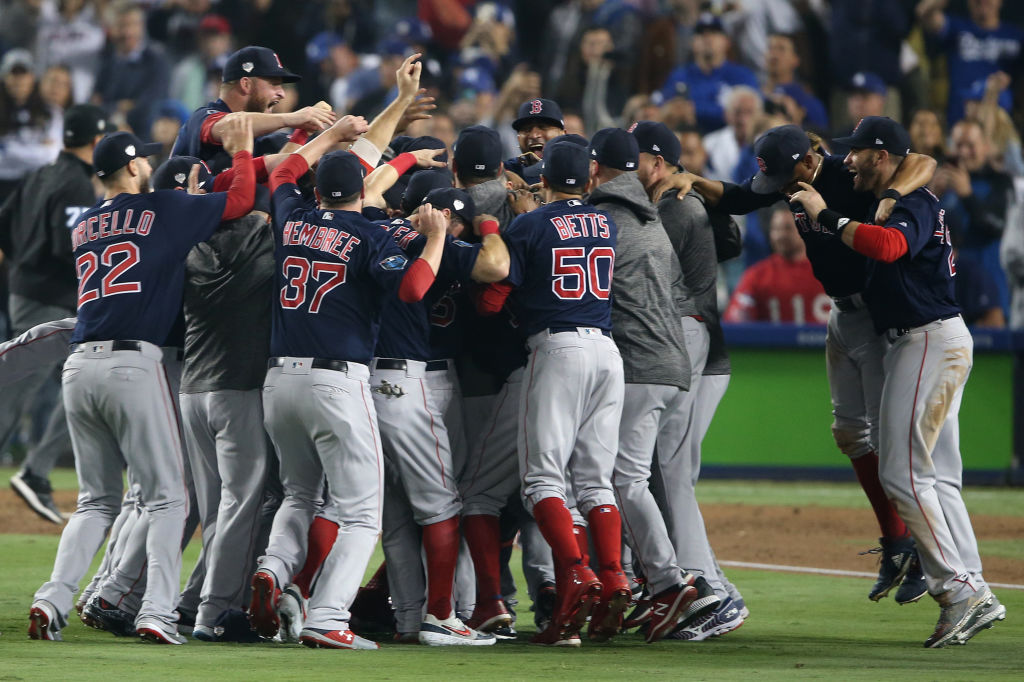 Members of the Boston Red Sox celebrate after the final out in the ninth inning to defeat the Los Angeles Dodgers in Game 5 of the 2018 World Series at Dodger Stadium on Sunday, October 28, 2018 in Los Angeles, California. (Photo by Rob Leiter/MLB Photos via Getty Images)
