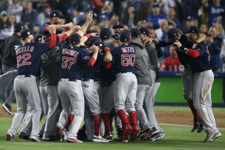 Members of the Boston Red Sox celebrate after the final out in the ninth inning to defeat the Los Angeles Dodgers in Game 5 of the 2018 World Series at Dodger Stadium on Sunday, October 28, 2018 in Los Angeles, California. (Photo by Rob Leiter/MLB Photos via Getty Images)
