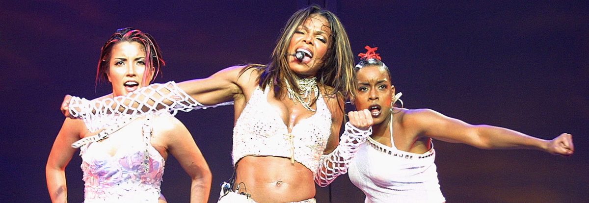 Janet Jackson (C) performs in concert August 23, 2001 at Madison Square Garden in New York City. (Photo by George De Sota/Getty Images)