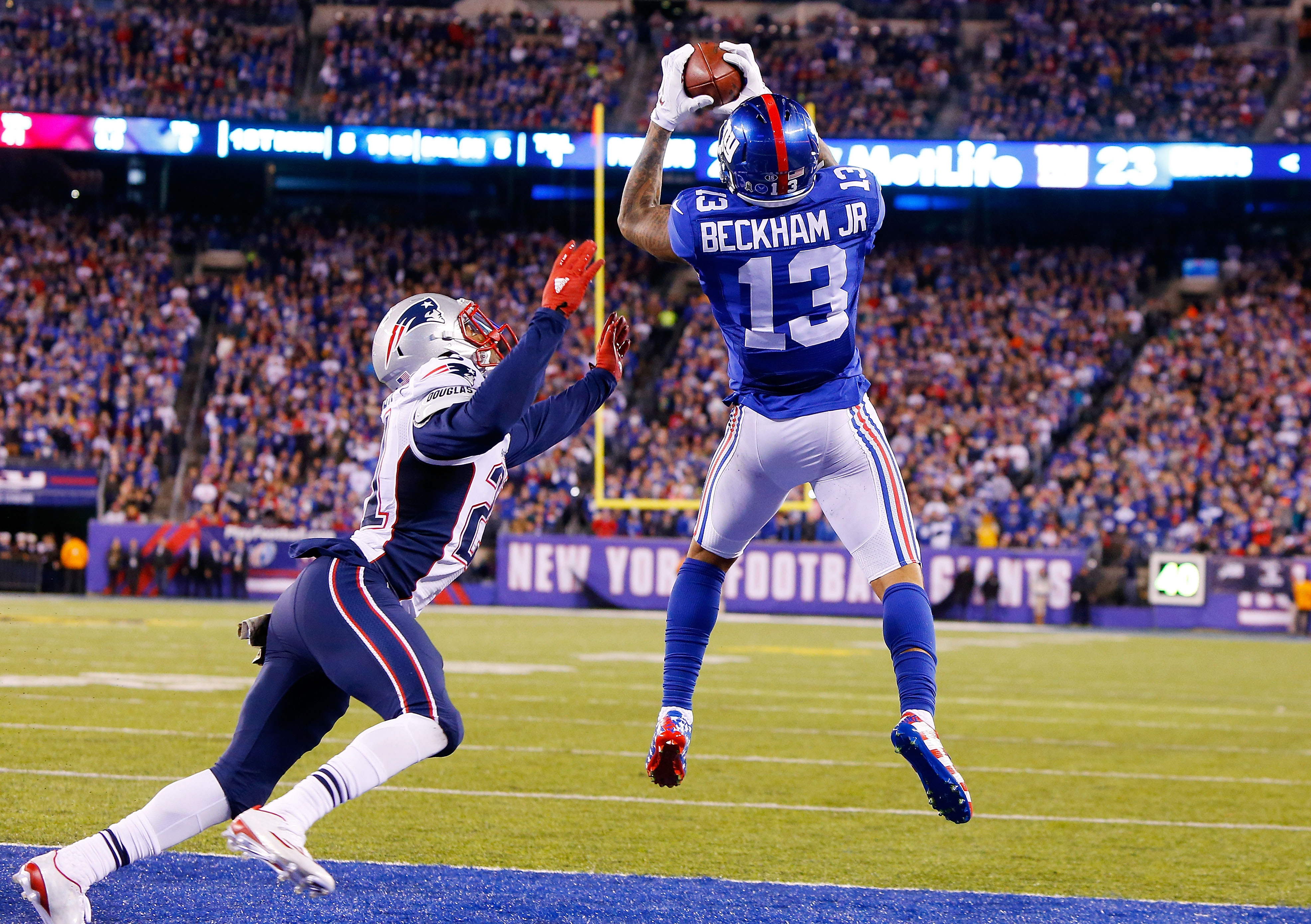 Odell Beckham #13 of the New York Giants in action against Malcolm Butler #21 of the New England Patriots on November 15, 2015 at MetLife Stadium in East Rutherford, New Jersey. The Patriots defeated the Giants 27-26.  (Photo by Jim McIsaac/Getty Images)