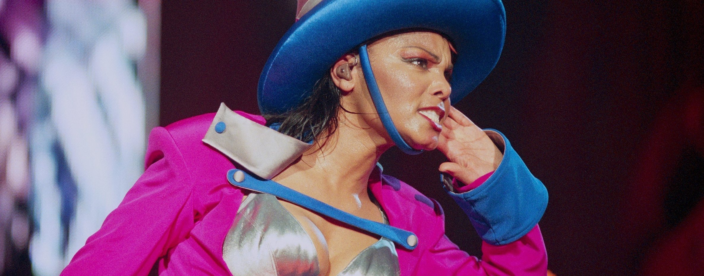 Janet Jackson performs on stage in 1998. (Photo by Phil Dent/Redferns)