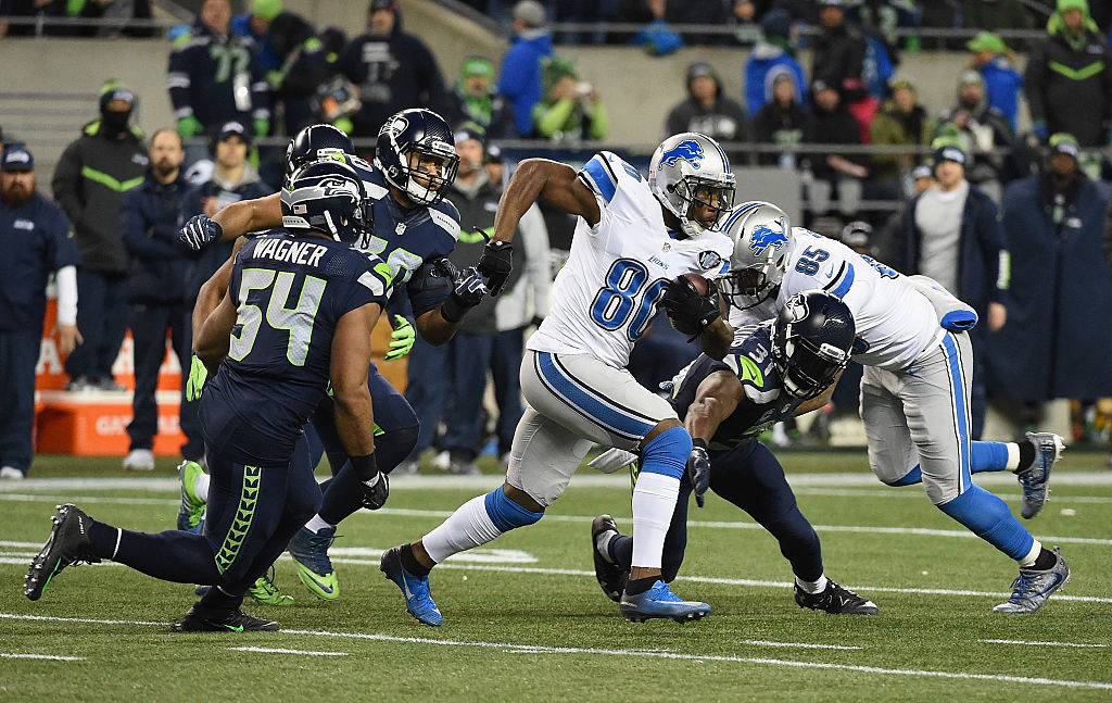 SEATTLE, WA - JANUARY 07:  Anquan Boldin #80 of the Detroit Lions runs with the ball during the first half against the Seattle Seahawks in the NFC Wild Card game at CenturyLink Field on January 7, 2017 in Seattle, Washington.  (Photo by Steve Dykes/Getty Images)