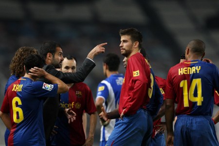 BARCELONA, SPAIN - SEPTEMBER 27: Barcelona coach Pep Guardiola (3rd L) of Barcelona instructs his players during the temporary stop due to supporters trouble during the La Liga match between Espanyol and Barcelona at the Montjuic Olympic Stadium on September 27, 2008 in Barcelona, Spain. Barcelona won the match with 2-1.  (Photo by Jasper Juinen/Getty Images)