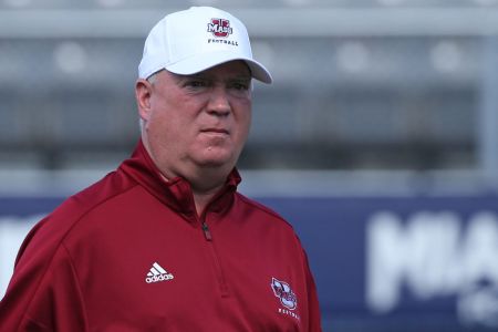 Head coach Mark Whipple of the Massachusetts Minutemen watches the players warm up prior to the game against the Florida International Golden Panthers on December 2, 2017 at Riccardo Silva Stadium in Miami, Florida. (Photo by Joel Auerbach/Getty Images)