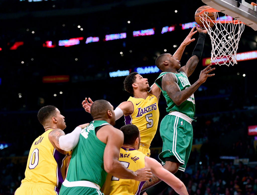 LOS ANGELES, CA - JANUARY 23:  Terry Rozier #12 of the Boston Celtics scores on a layup in front of Josh Hart #5 of the Los Angeles Lakers during a 108-107 Laker win at Staples Center on January 23, 2018 in Los Angeles, California.  (Photo by Harry How/Getty Images)