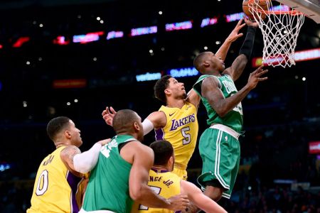 LOS ANGELES, CA - JANUARY 23:  Terry Rozier #12 of the Boston Celtics scores on a layup in front of Josh Hart #5 of the Los Angeles Lakers during a 108-107 Laker win at Staples Center on January 23, 2018 in Los Angeles, California.  (Photo by Harry How/Getty Images)
