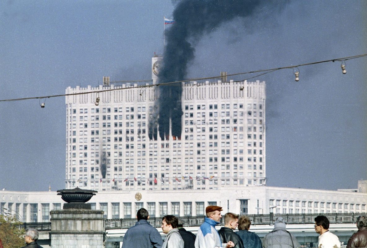 The Russian parliament building, also known as the White House, burning during the parliamentary revolt in Moscow by Communist hardliners against Boris Yeltsin. (ALEXANDER NEMENOV/AFP/Getty Images)