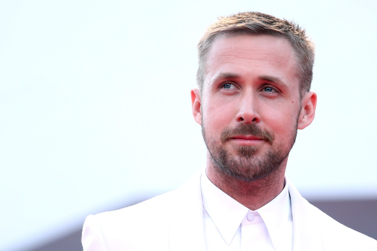 Ryan Gosling walks the red carpet ahead of the opening ceremony and the 'First Man' screening during the 75th Venice Film Festival at Sala Grande on August 29, 2018 in Venice, Italy. Gosling developed a relationship with Neil Armstrong's two sons ahead of the filming of "First Man." (Photo by Maria Moratti/Contigo/Getty Images)