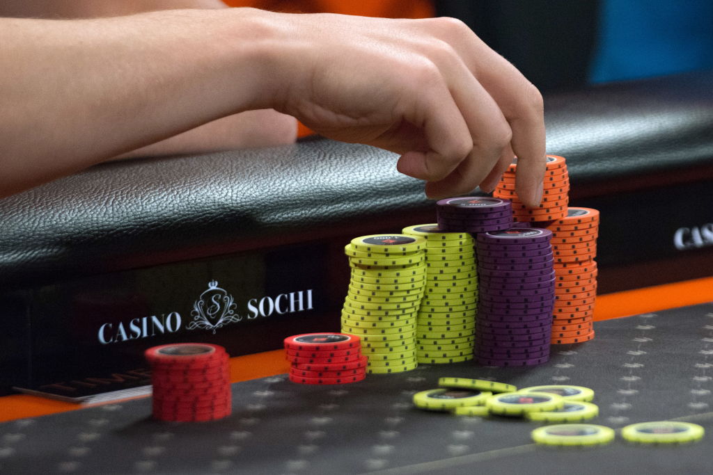 SOCHI, RUSSIA - AUGUST 10, 2018: A person with poker chips during a poker round as part of the Millions Russia poker tournament with the record-breaking guaranteed prize pool of $9 million, at the Sochi Casino and Resort. Artur Lebedev/TASS (Photo by Artur LebedevTASS via Getty Images)