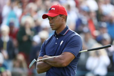 PARIS, FRANCE - SEPTEMBER 30:  Tiger Woods of the United States reacts during singles matches of the 2018 Ryder Cup at Le Golf National on September 30, 2018 in Paris, France.  (Photo by Jamie Squire/Getty Images)