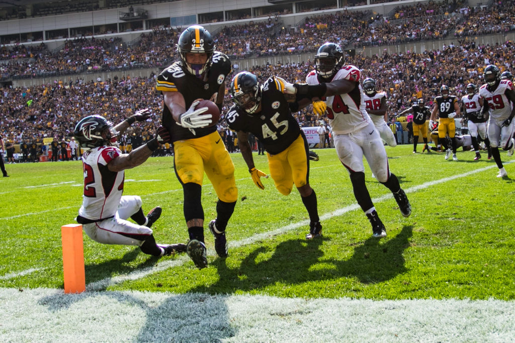 PITTSBURGH, PA - OCTOBER 07: Pittsburgh Steelers running back James Conner (30) scores a rushing touchdown during the NFL football game between the Atlanta Falcons and the Pittsburgh Steelers on October 7, 2018 at Heinz Field in Pittsburgh, PA. (Photo by Mark Alberti/Icon Sportswire via Getty Images)