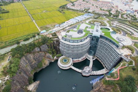 An aerial view of the luxury hotel InterContinental Shanghai Wonderland built inside a deserted quarry pit in southwestern Shanghai. (Feature China / Barcroft Images / Barcroft Media via Getty Images)