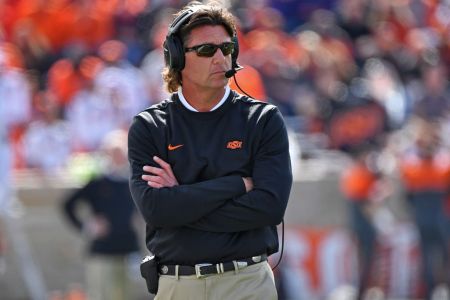 Oklahoma State coach Mike Gundy on the sideline. (Peter G. Aiken/Getty Images)