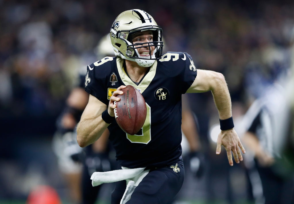 Quarterback Drew Brees #9 of the New Orleans Saints runs with the ball during the second quarter of the game against the Los Angeles Rams at Mercedes-Benz Superdome on November 4, 2018 in New Orleans, Louisiana.  (Photo by Wesley Hitt/Getty Images)