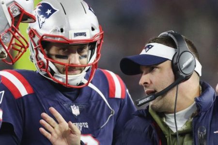 FOXBOROUGH, MA - NOVEMBER 04:  Tom Brady #12 talks with Brian Hoyer #2, offensive coordinator Josh McDaniels and head coach Bill Belichick of the New England Patriots during the first half against the Green Bay Packers at Gillette Stadium on November 4, 2018 in Foxborough, Massachusetts.  (Photo by Maddie Meyer/Getty Images)