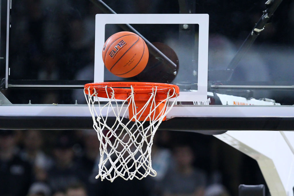PROVIDENCE, RI - NOVEMBER 06: A general view of the game ball on the rim during a college basketball game between Siena Saints and Providence Friars on November 6, 2018, at the Dunkin Donuts Center in Providence, RI. (Photo by M. Anthony Nesmith/Icon Sportswire via Getty Images)
