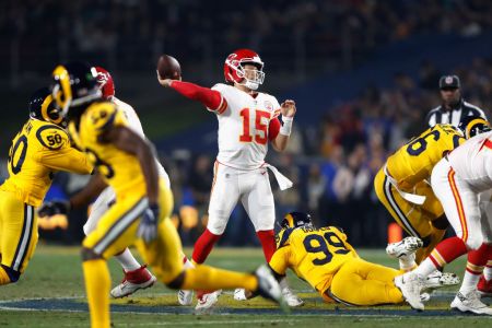 LOS ANGELES, CA - NOVEMBER 19:  Quarterback Patrick Mahomes #15 of the Kansas City Chiefs passes against the Los Angeles Rams in the second quarter of the game at Los Angeles Memorial Coliseum on November 19, 2018 in Los Angeles, California.  (Photo by Sean M. Haffey/Getty Images)