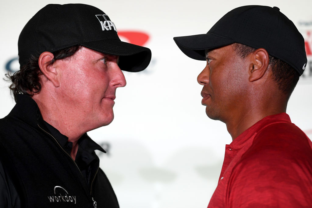 Pro golfers Phil Mickelson and Tiger Woods