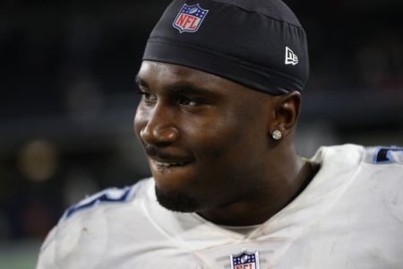 Dion Lewis #33 of the Tennessee Titans celebrates a 28-14 win against the Dallas Cowboys at AT&T Stadium on November 05, 2018 in Arlington, Texas. (Photo by Ronald Martinez/Getty Images)