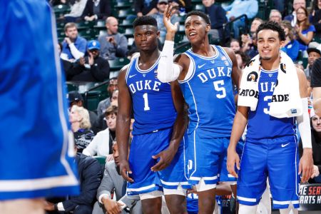 INDIANAPOLIS, IN - NOVEMBER 06: Zion Williamson #1, RJ Barrett #5 and Tre Jones #3 of the Duke Blue Devils react from the bench during the State Farm Champions Classic against the Kentucky Wildcats at Bankers Life Fieldhouse on November 6, 2018 in Indianapolis, Indiana. Duke defeated Kentucky 118-84. (Photo by Joe Robbins/Getty Images)