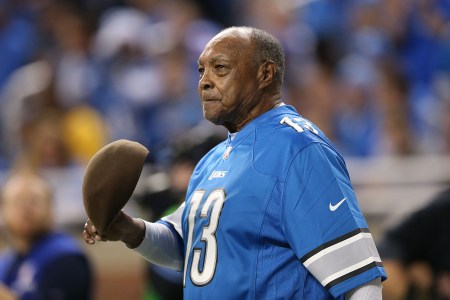 DETROIT, MI - DECEMBER 16:  Former Detroit Lions player Wallace "Wally" Triplett waves to the fans during the game against the Baltimore Ravens at Ford Field on December 16, 2013 in Detroit, Michigan.  (Photo by Leon Halip/Getty Images)