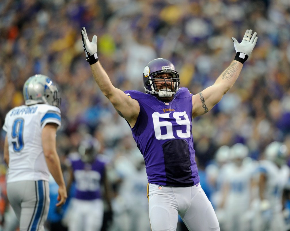 MINNEAPOLIS, MN - DECEMBER 29: Jared Allen #69 of the Minnesota Vikings celebrates a sack as Matthew Stafford #9 of the Detroit Lions looks on during the first quarter of the game on December 29, 2013 at Mall of America Field at the Hubert H. Humphrey Metrodome in Minneapolis, Minnesota. (Photo by Hannah Foslien/Getty Images)