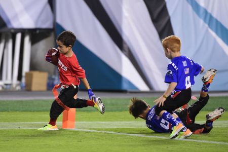 PHILADELPHIA, PA - AUGUST 24: Local children participate in flag football at half time during a NFL preseason game between the Miami Dolphins and the Philadelphia Eagles on August 24, 2017 at Lincoln Financial Field in Philadelphia, PA. Eagles won 38-31.(Photo by Andy Lewis/Icon Sportswire via Getty Images)