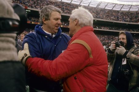 NY Giants coach Bill Parcells (L) shakes hands with the 49ers' Bill Walsh back in the mid-1980s. (Focus on Sport/Getty Images)