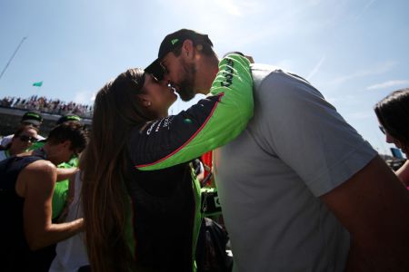 INDIANAPOLIS, IN - MAY 27:  Danica Patrick, driver of the #13 GoDaddy Chevrolet kisses Aaron Rodgers prior to the 102nd Running of the Indianapolis 500 at Indianapolis Motorspeedway on May 27, 2018 in Indianapolis, Indiana.  (Photo by Chris Graythen/Getty Images)