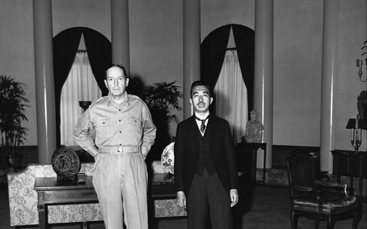 Emperor Hirohito is received by General Douglas MacArthur, U.S. commander of the Japanese occupation, at the U.S. embassy in Tokyo. The Emperor is attired in morning clothes for this precedent-shattering visit. September 1945. (Photo by © CORBIS/Corbis via Getty Images)