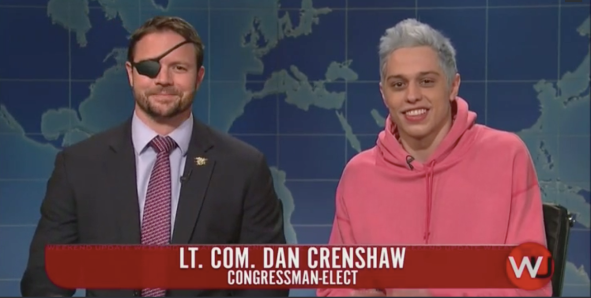 Former Lt. Com. Dan Crenshaw (left) appearing alongside cast member Pete Davidson on SNL's "Weekend Update," November 11, 2018. (Photo credit: NBC)