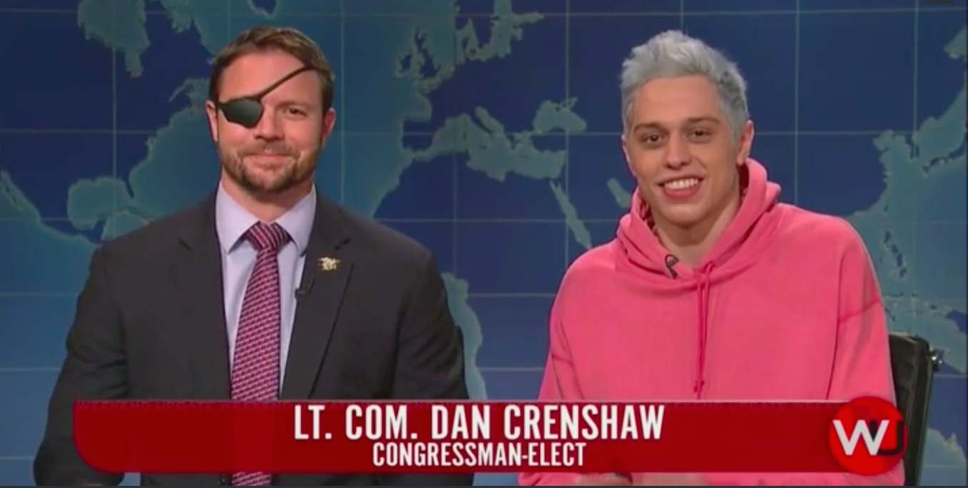 Former Lt. Com. Dan Crenshaw (left) appearing alongside cast member Pete Davidson on SNL's "Weekend Update," November 11, 2018. (Photo credit: NBC)