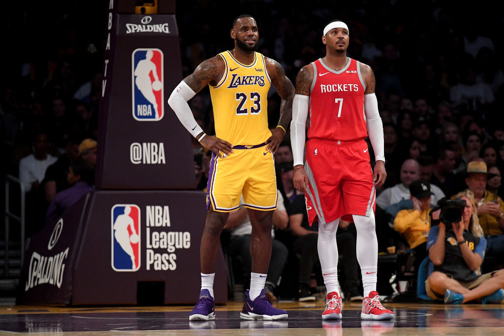 LOS ANGELES, CA - OCTOBER 20:  LeBron James #23 of the Los Angeles Lakers and Carmelo Anthony #7 of the Houston Rockets wait for and inbound at Staples Center on October 20, 2018 in Los Angeles, California.  (Photo by Harry How/Getty Images)