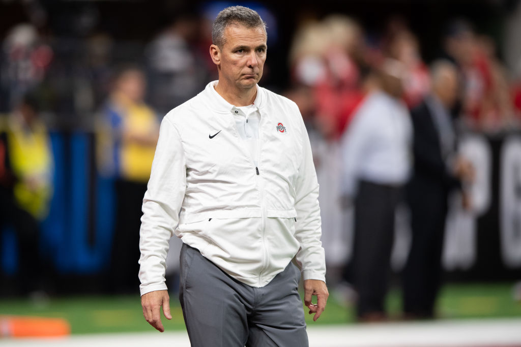 INDIANAPOLIS, IN - DECEMBER 01: Ohio State Buckeyes head coach Urban Meyer watches his team warm up before the Big 10 Championship game between the Northwestern Wildcats and Ohio State Buckeyes on December 1, 2018, at Lucas Oil Stadium in Indianapolis, IN. (Photo by Zach Bolinger/Icon Sportswire via Getty Images)
