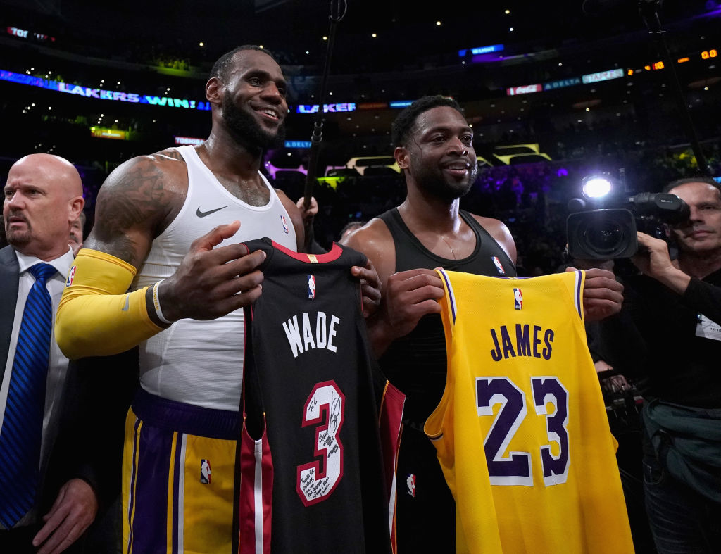 LOS ANGELES, CA - DECEMBER 10:  LeBron James #23 of the Los Angeles Lakers and Dwyane Wade #3 of the Miami Heat pose for a photo after exchanging jerseys, as Wade plans to retire at the end of the season, after a 108-105 Laker win at Staples Center on December 10, 2018 in Los Angeles, California. (Photo by Harry How/Getty Images)