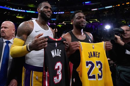 LOS ANGELES, CA - DECEMBER 10:  LeBron James #23 of the Los Angeles Lakers and Dwyane Wade #3 of the Miami Heat pose for a photo after exchanging jerseys, as Wade plans to retire at the end of the season, after a 108-105 Laker win at Staples Center on December 10, 2018 in Los Angeles, California. (Photo by Harry How/Getty Images)
