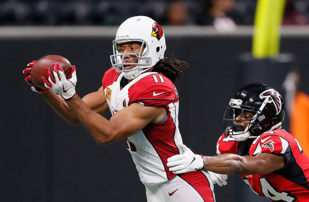 ATLANTA, GA - DECEMBER 16:  Larry Fitzgerald #11 of the Arizona Cardinals pulls in this reception against Brian Poole #34 of the Atlanta Falcons at Mercedes-Benz Stadium on December 16, 2018 in Atlanta, Georgia.  (Photo by Kevin C. Cox/Getty Images)