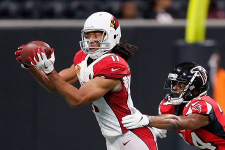 ATLANTA, GA - DECEMBER 16:  Larry Fitzgerald #11 of the Arizona Cardinals pulls in this reception against Brian Poole #34 of the Atlanta Falcons at Mercedes-Benz Stadium on December 16, 2018 in Atlanta, Georgia.  (Photo by Kevin C. Cox/Getty Images)