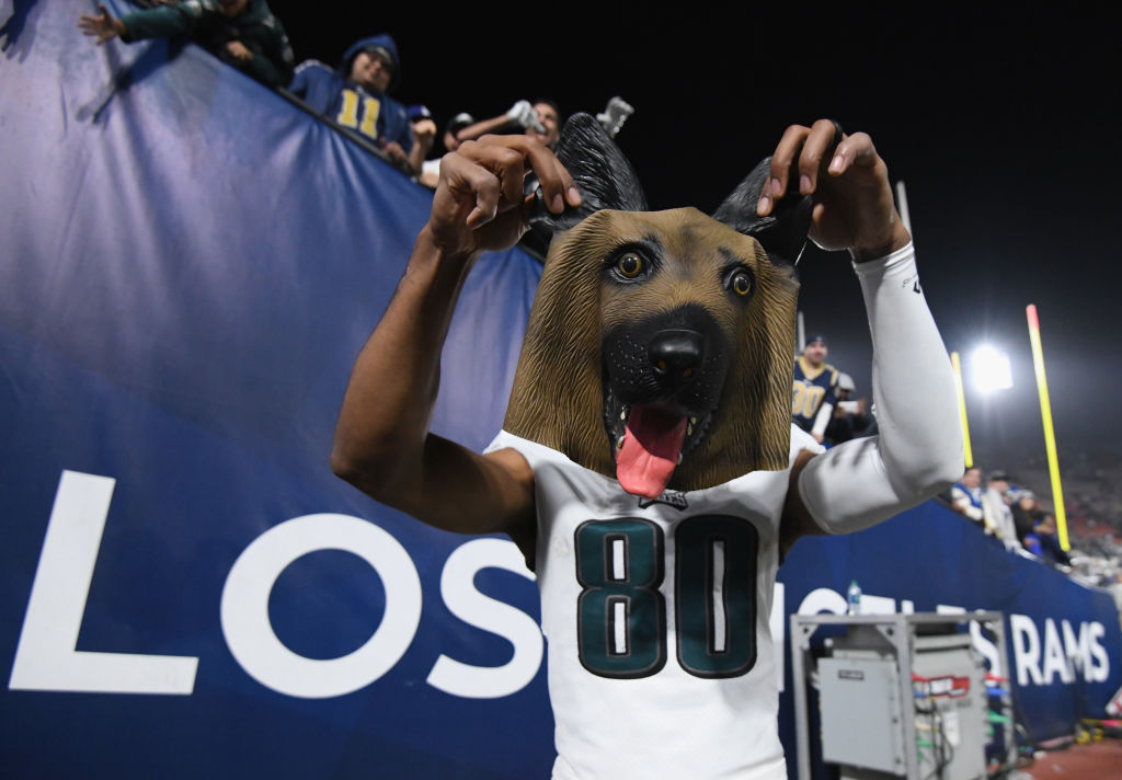 LOS ANGELES, CA - DECEMBER 16:  Jordan Matthews #80 of the Philadelphia Eagles holds up a dog mask recevied from a fan after a 30-23 win over the Los Angeles Rams at Los Angeles at Los Angeles Memorial Coliseum on December 16, 2018 in Los Angeles, California.  (Photo by Harry How/Getty Images)