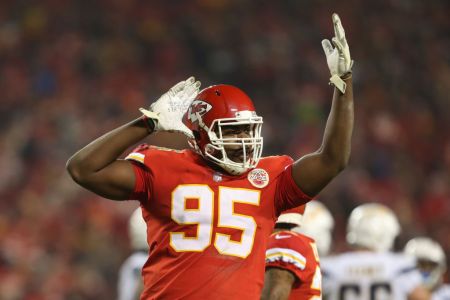 KANSAS CITY, MO - DECEMBER 13: Kansas City Chiefs defensive end Chris Jones (95) encourages the crowd to get loud in the second quarter of an NFL game between the Los Angeles Chargers and Kansas City Chiefs on December 13, 2018 at Arrowhead Stadium in Kansas City, MO.  (Photo by Scott Winters/Icon Sportswire via Getty Images)