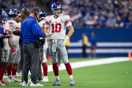 INDIANAPOLIS, IN - DECEMBER 23: New York Giants head coach Pat Shurmur talks to New York Giants quarterback Eli Manning (10) during the NFL game between the New York Giants and Indianapolis Colts on December 23, 2018, at Lucas Oil Stadium in Indianapolis, IN. (Photo by Zach Bolinger/Icon Sportswire via Getty Images)