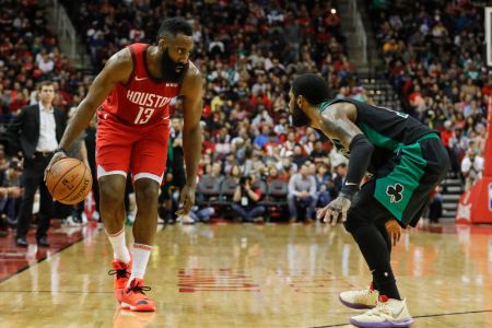 HOUSTON, TX - DECEMBER 27:  James Harden #13 of the Houston Rockets controls the ball defended by Kyrie Irving #11 of the Boston Celtics in the second half at Toyota Center on December 27, 2018 in Houston, Texas.   (Photo by Tim Warner/Getty Images)