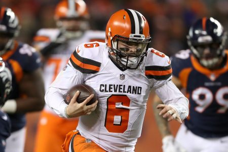 Quarterback Baker Mayfield #4 of the Cleveland Browns carries the ball against the Denver Broncos at Broncos Stadium at Mile High on December 15, 2018 in Denver, Colorado. (Photo by Matthew Stockman/Getty Images)