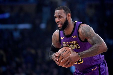 LOS ANGELES, CALIFORNIA - DECEMBER 21:  LeBron James #23 of the Los Angeles Lakers palms the ball before the game against the New Orleans Pelicans at Staples Center on December 21, 2018 in Los Angeles, California. (Photo by Harry How/Getty Images)