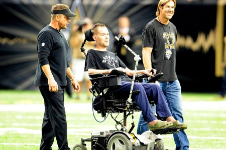 NEW ORLEANS, LA - SEPTEMBER 08:  ( L to R ) Sean Payton, head coach of the New Orleans Saints, takes the field with former players Steve Gleason and Scott Fujita prior to a game against the Atlanta Falcons at the Mercedes-Benz Superdome on September 8, 2013 in New Orleans, Louisiana.  The Saints defeated the Atlanta Falcons 23-17.  (Photo by Stacy Revere/Getty Images)