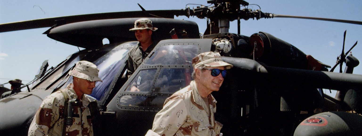 President George H.W. Bush visits Somalia in 1992. (Photo by Larry Downing/Sygma/Sygma via Getty Images)