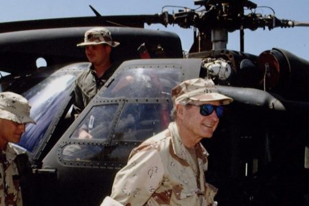 President George H.W. Bush visits Somalia in 1992. (Photo by Larry Downing/Sygma/Sygma via Getty Images)