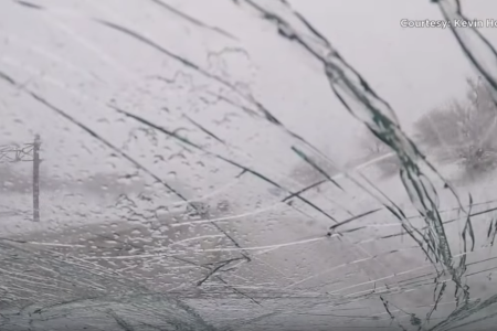 Falling snow cracked one commuter's windshield (Kevin Hoffer)