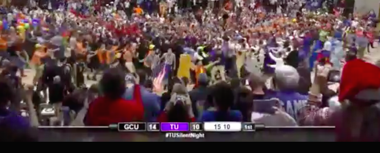 Screenshot of Taylor University fans storming the court during the school's annual "Silent Night" game. (Photo: ESPN)